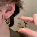 One Pair, Infinite Looks: Tiger’s Eye Hoops That Elevate Every Outfit