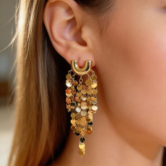 Shimmering gold meets an ivory gown, every turn bathed in spotlight