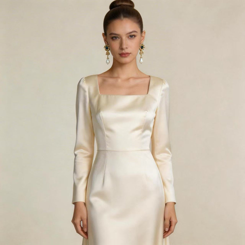 Pearl flowers illuminate your face, radiating elegance by your ears.